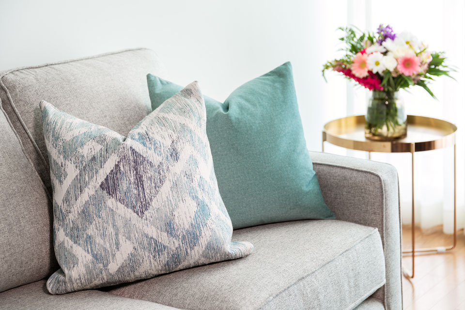 Sofa and pillow in a suite at The Waterside Inn